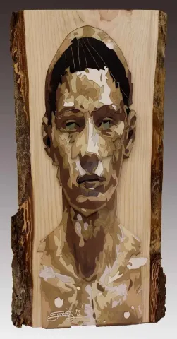 Bu eser EMRE LÜLE tarafından 2015 yılında 60x29 cm ölçülerinde Pleksi+Ahşap tekniği ile yapılmıştır.