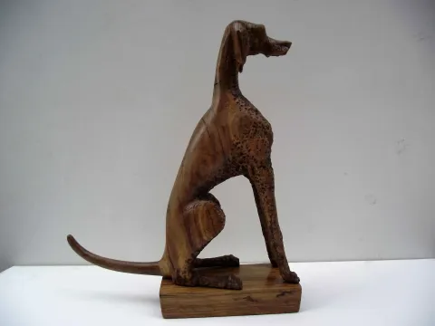 "Weimaraner" eseri HAKAN ERASLAN tarafından 2016 yılında 40x47x11 cm ölçülerinde Zeytin Ağacı Yontu tekniği ile yapılmıştır.